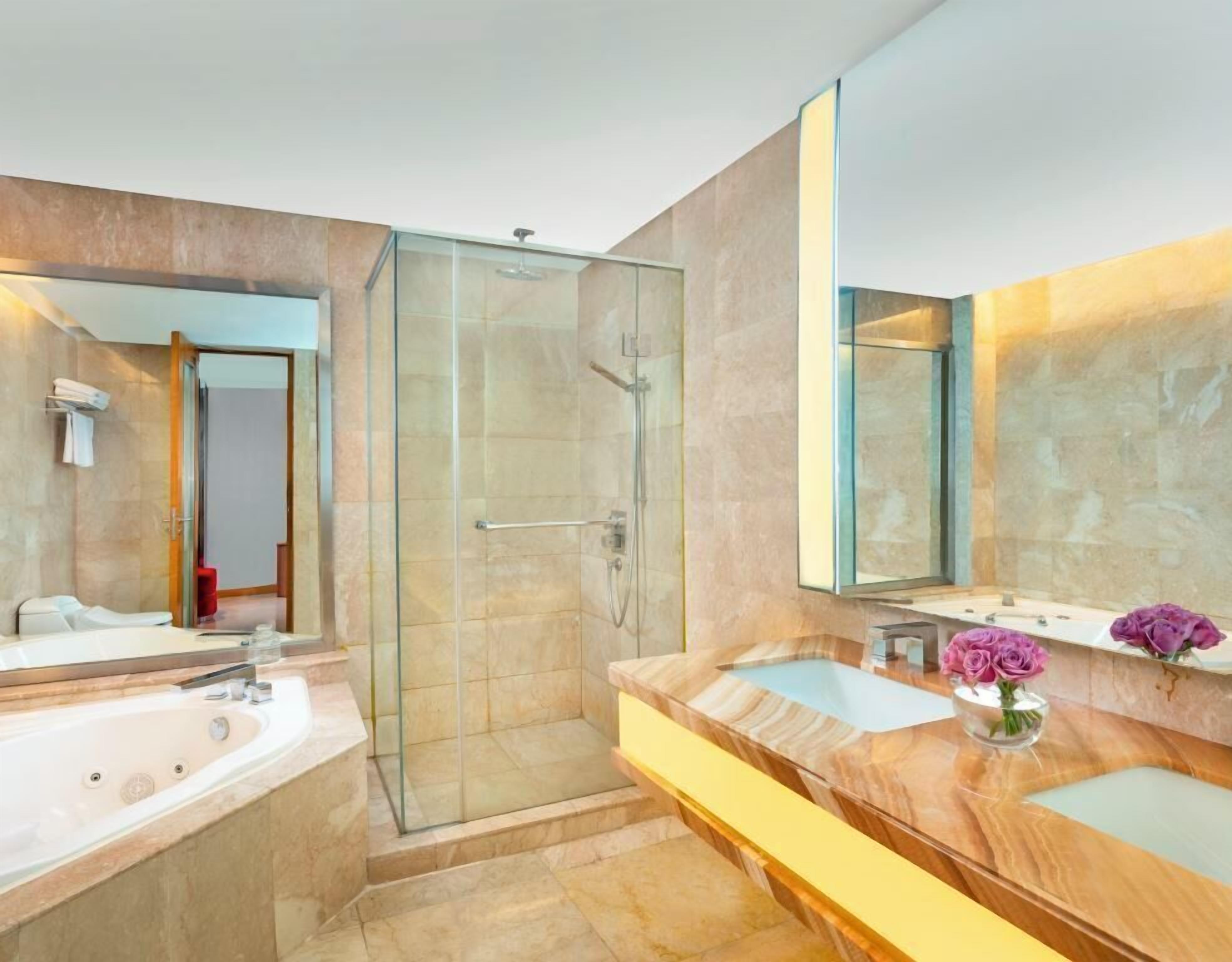 presidential suite | bathroom | free toiletries, hair dryer, slippers, towels