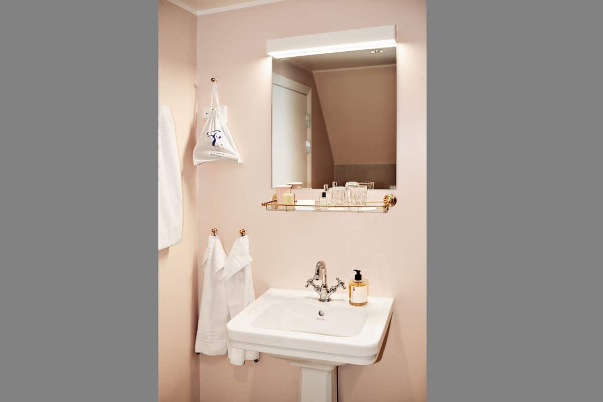 junior suite | bathroom | hair dryer, heated floors, towels, soap