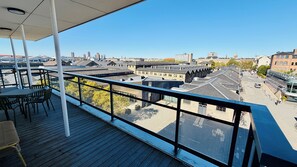 Suite with balcony | Hypo-allergenic bedding, in-room safe, desk, blackout curtains
