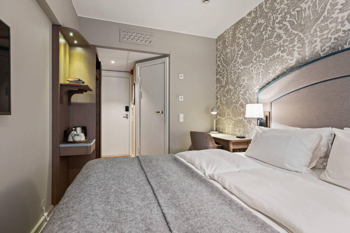 Chambre Deluxe, 1 lit double | Bureau, rideaux occultants, draps fournis