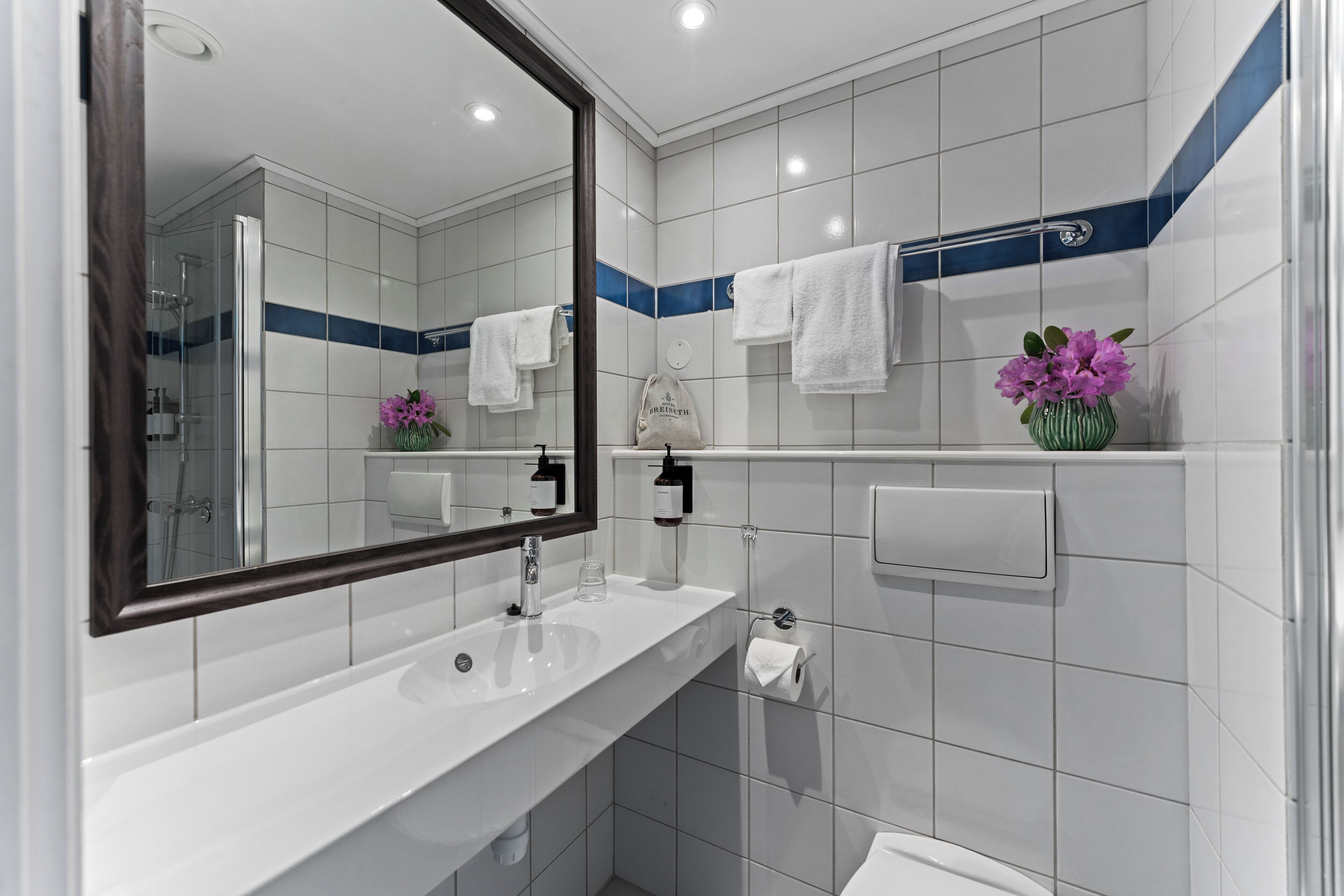 free toiletries, hair dryer, heated floors, towels