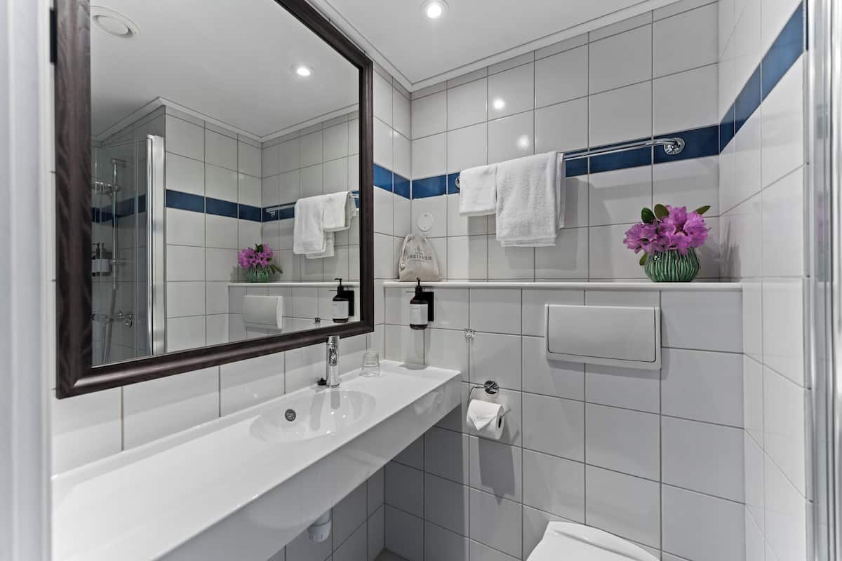 free toiletries, hair dryer, heated floors, towels