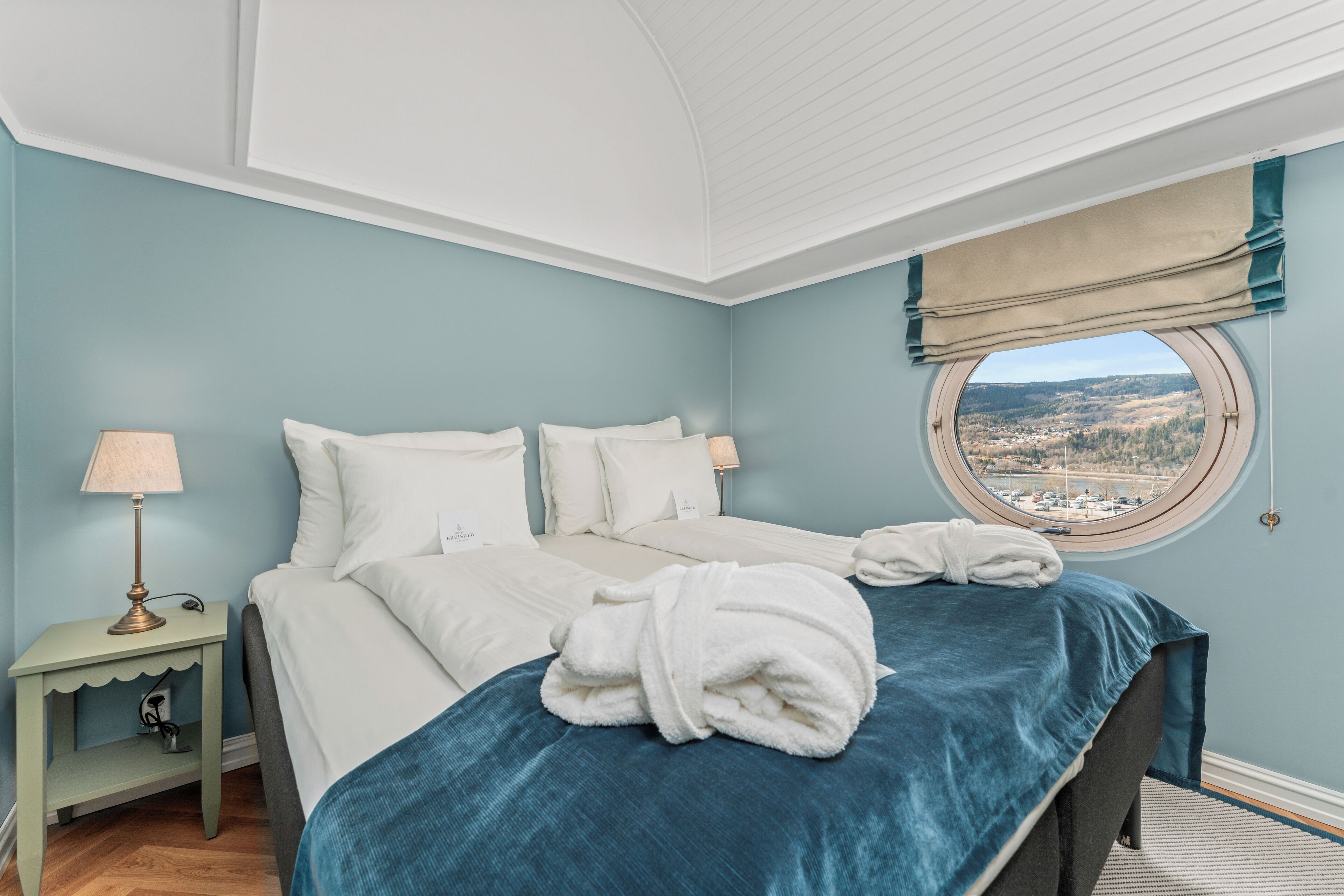 suite | premium bedding, desk, laptop workspace, blackout curtains