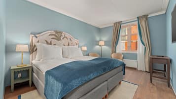 King Room | Premium bedding, desk, laptop workspace, blackout curtains