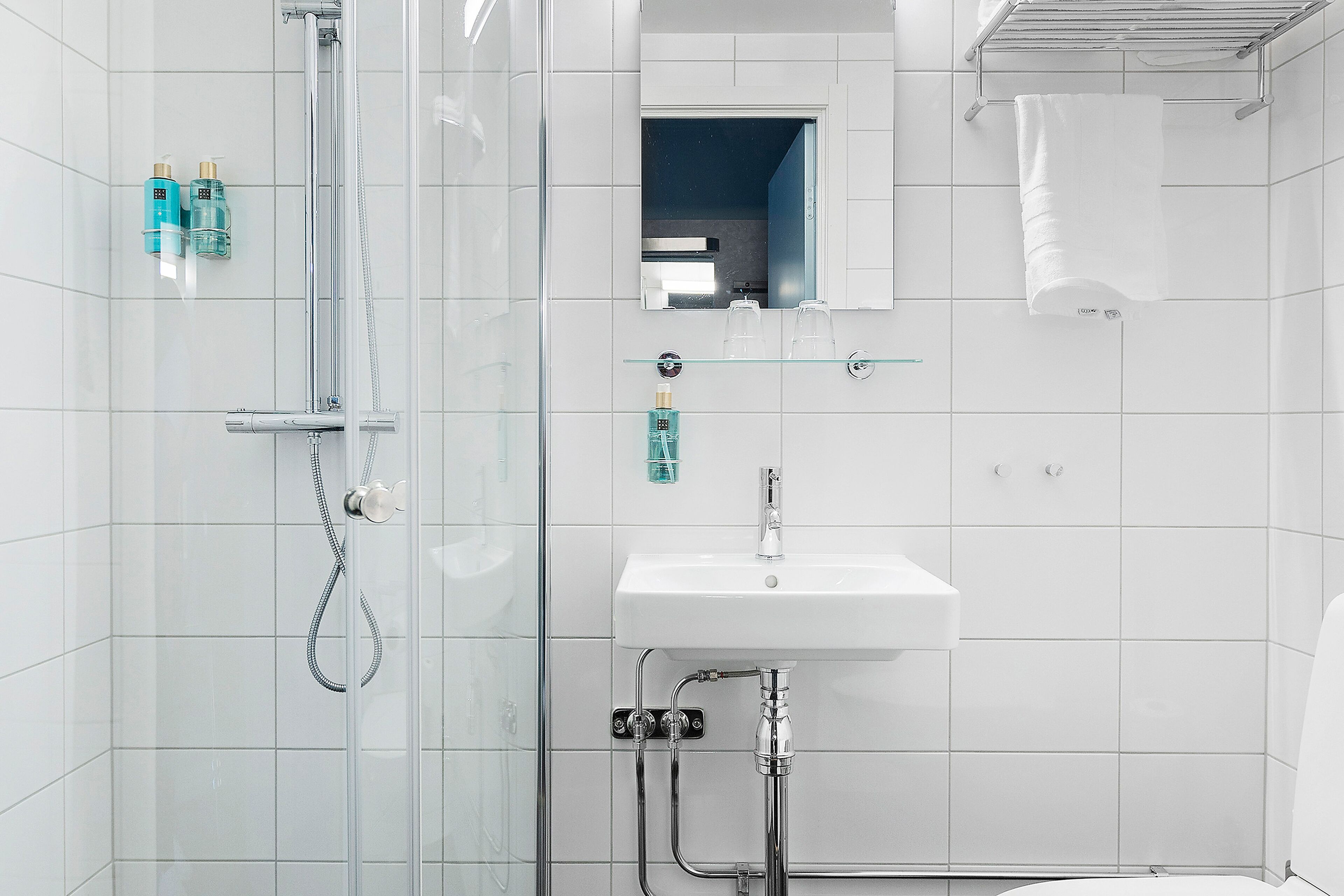 hair dryer, towels, toilet paper