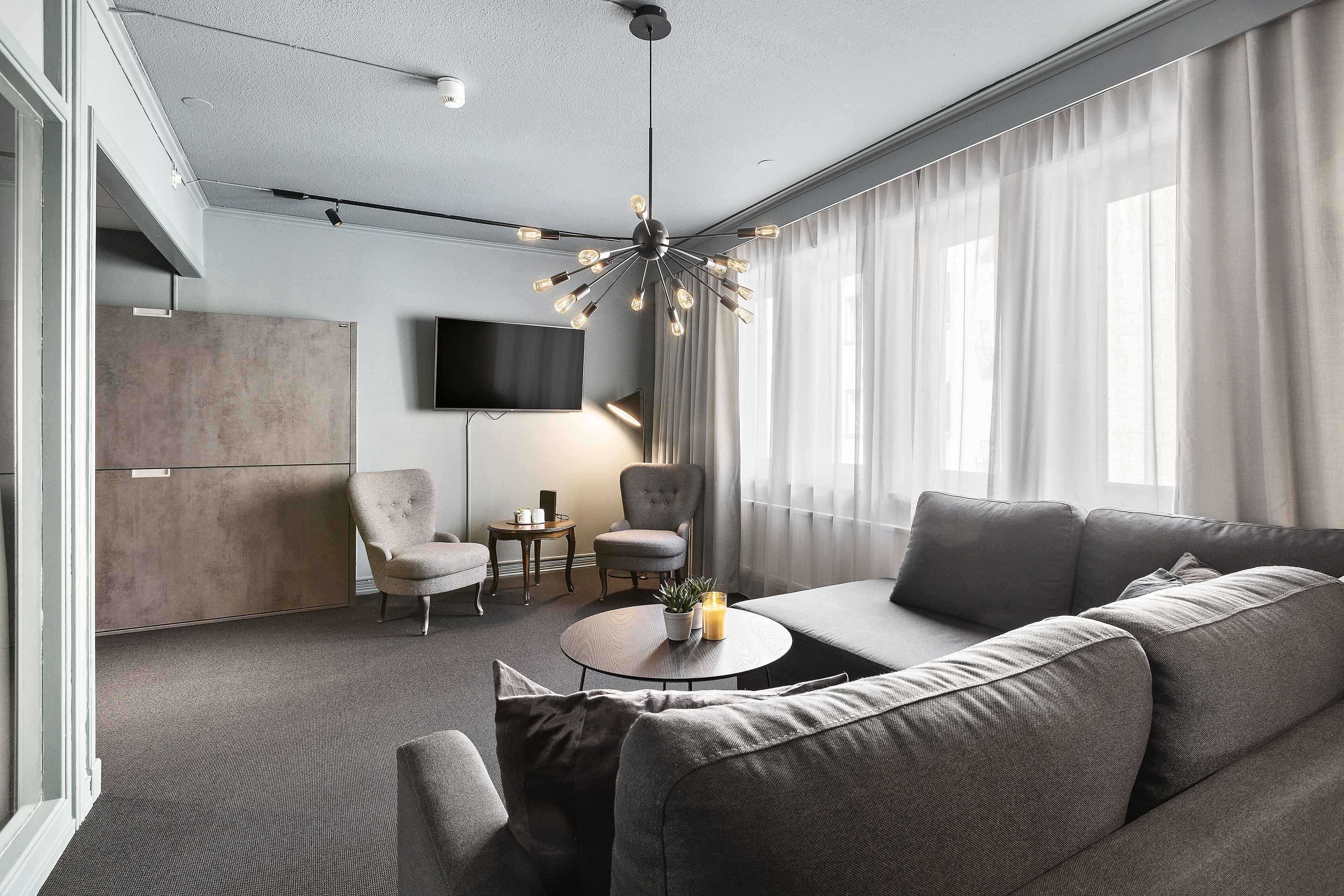 suite, 1 king bed, non smoking | pillow-top beds, in-room safe, iron/ironing board, cots/infant beds