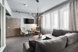 Suite, 1 King Bed, Non Smoking | Pillowtop beds, in-room safe, iron/ironing board, cribs/infant beds