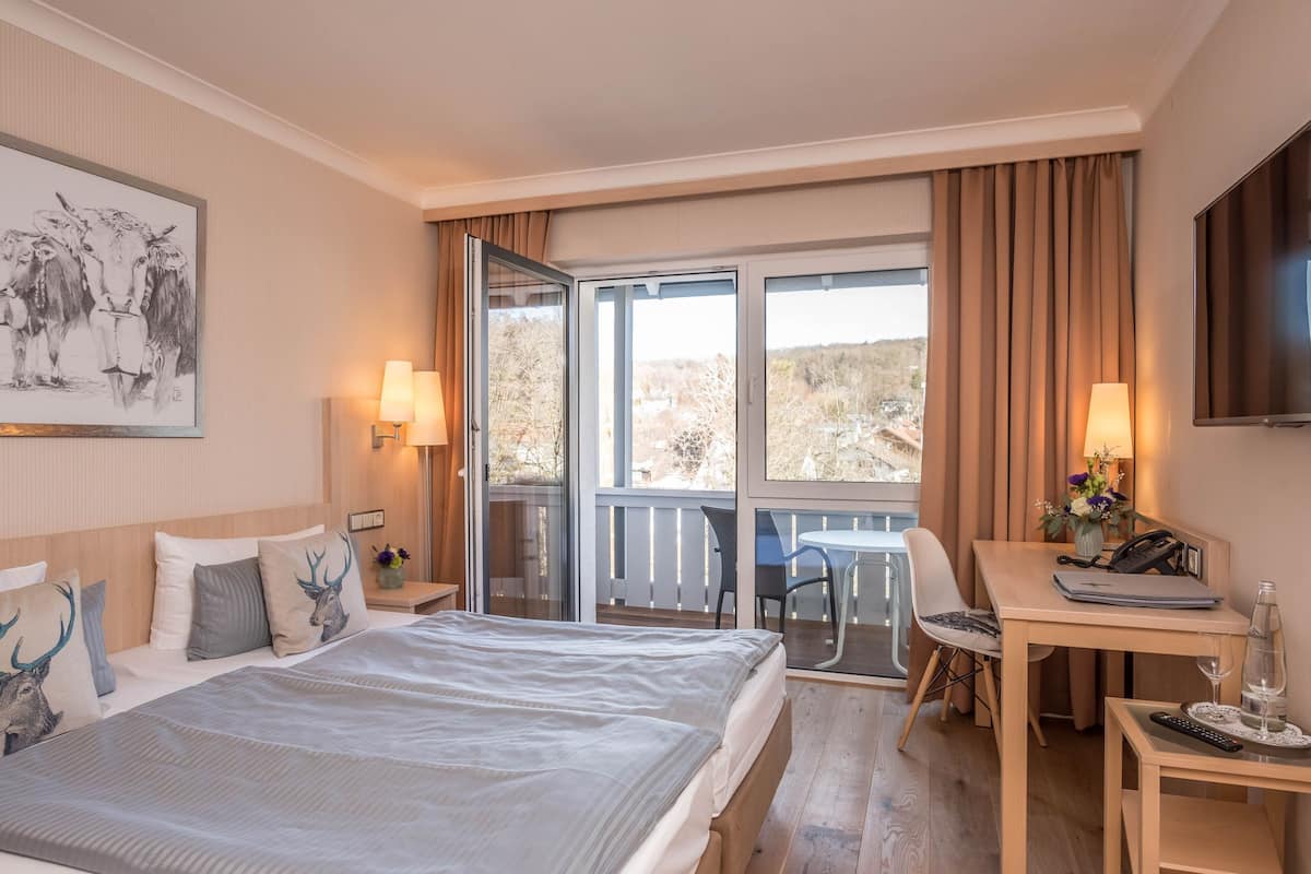 Standard Double Room, Balcony (Landside) | In-room safe, desk, iron/ironing board, free cots/infant beds