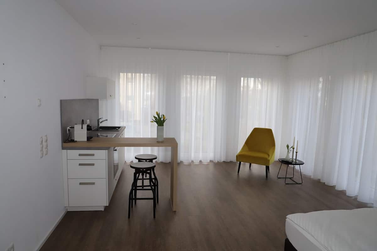 Superior Studio | Living area | Flat-screen TV