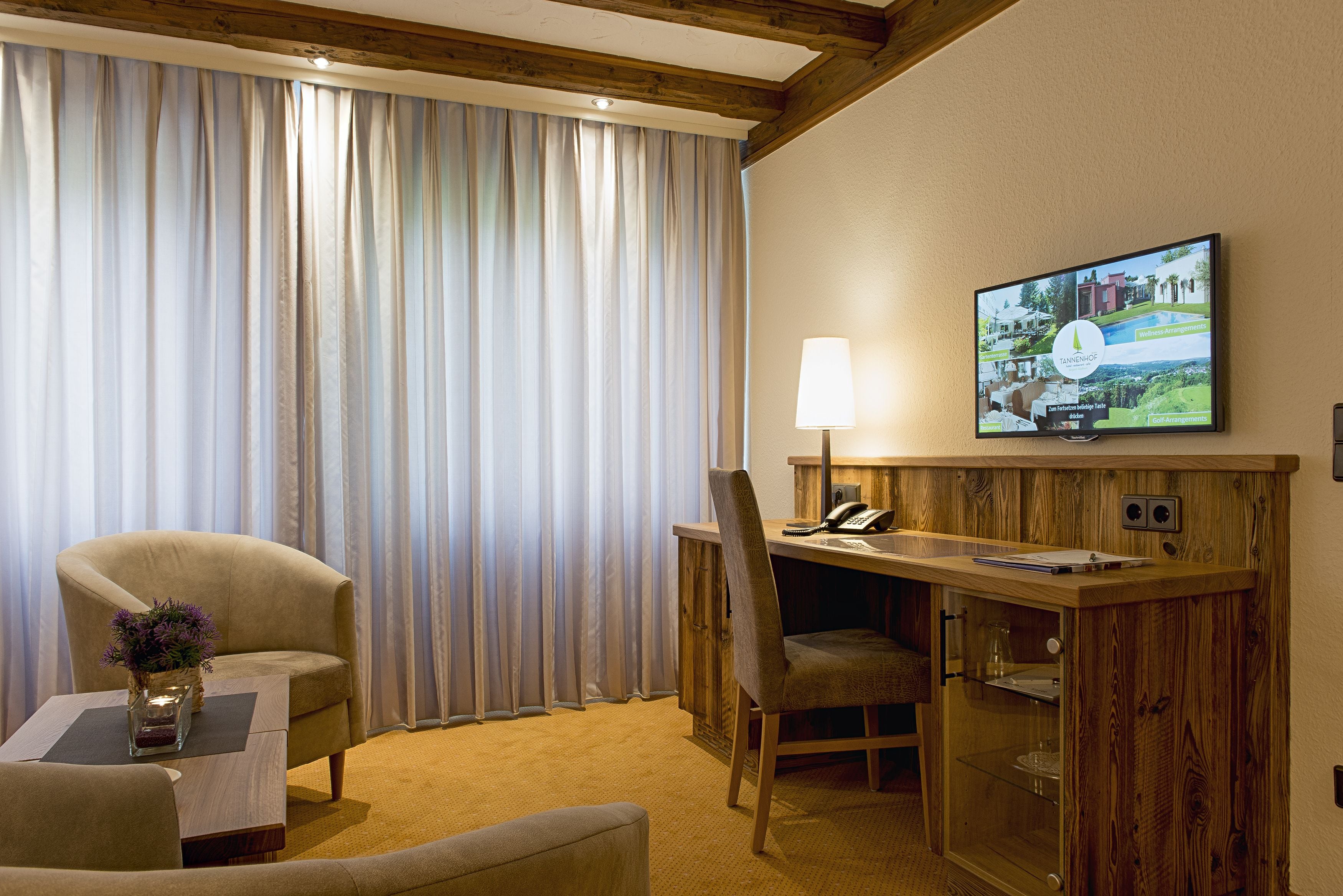 family suite, 2 bedrooms | living area | flat-screen tv