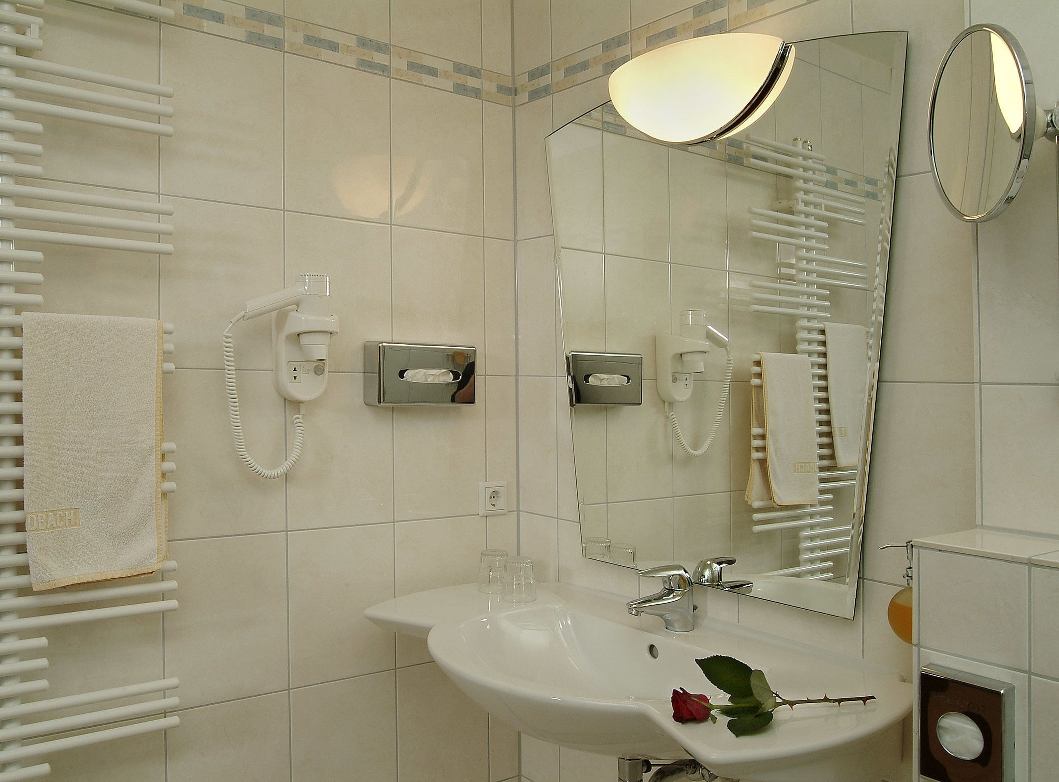 hair dryer, towels, soap, shampoo