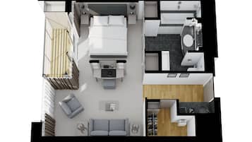 Distribución moderna de una habitación de hotel con cama, zona de estar y una pequeña kitchenette.