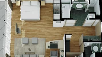 Distribución de una habitación de hotel con cama, sofá y una pequeña kitchenette.