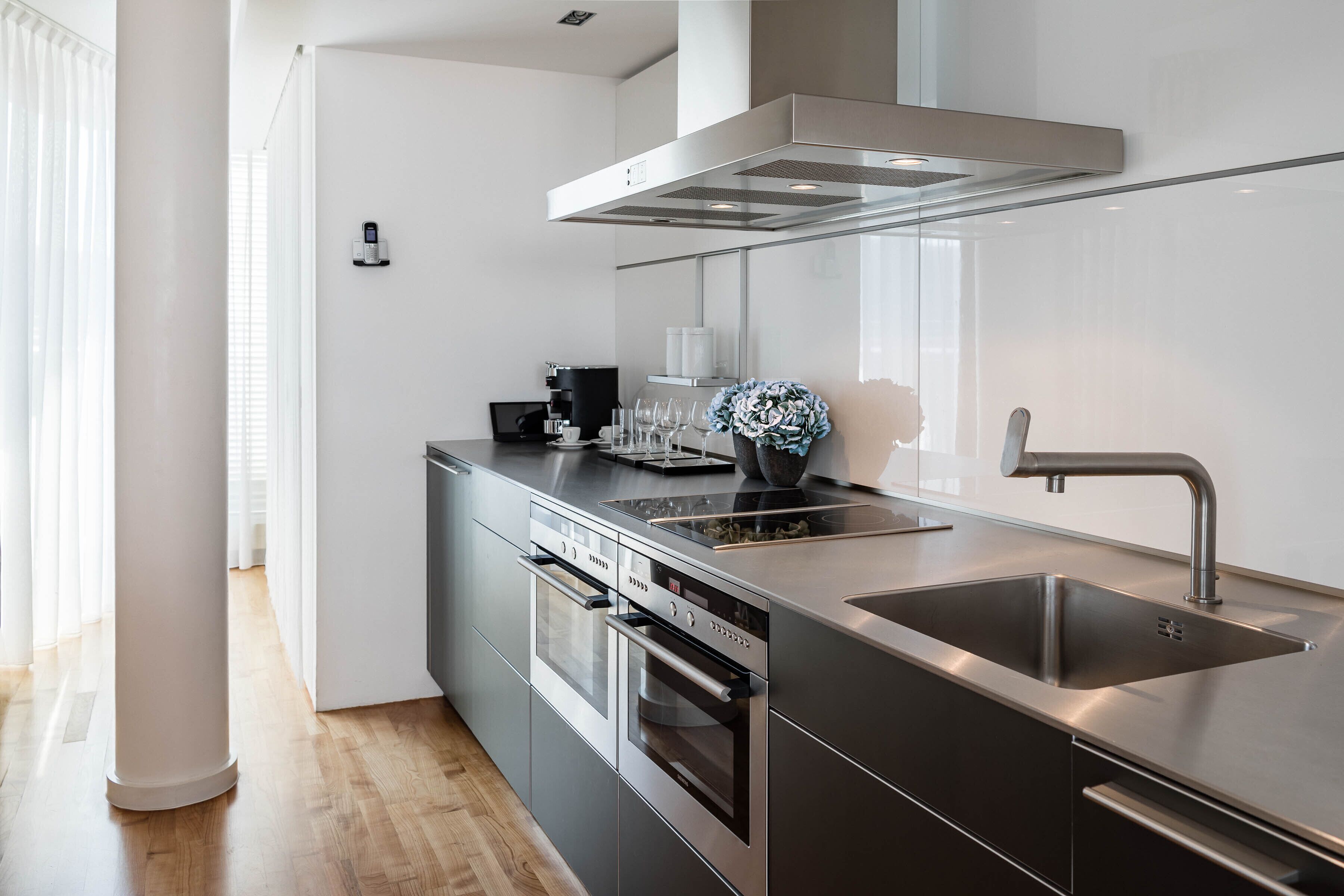 fridge, coffee/tea maker, cookware/dishes/utensils