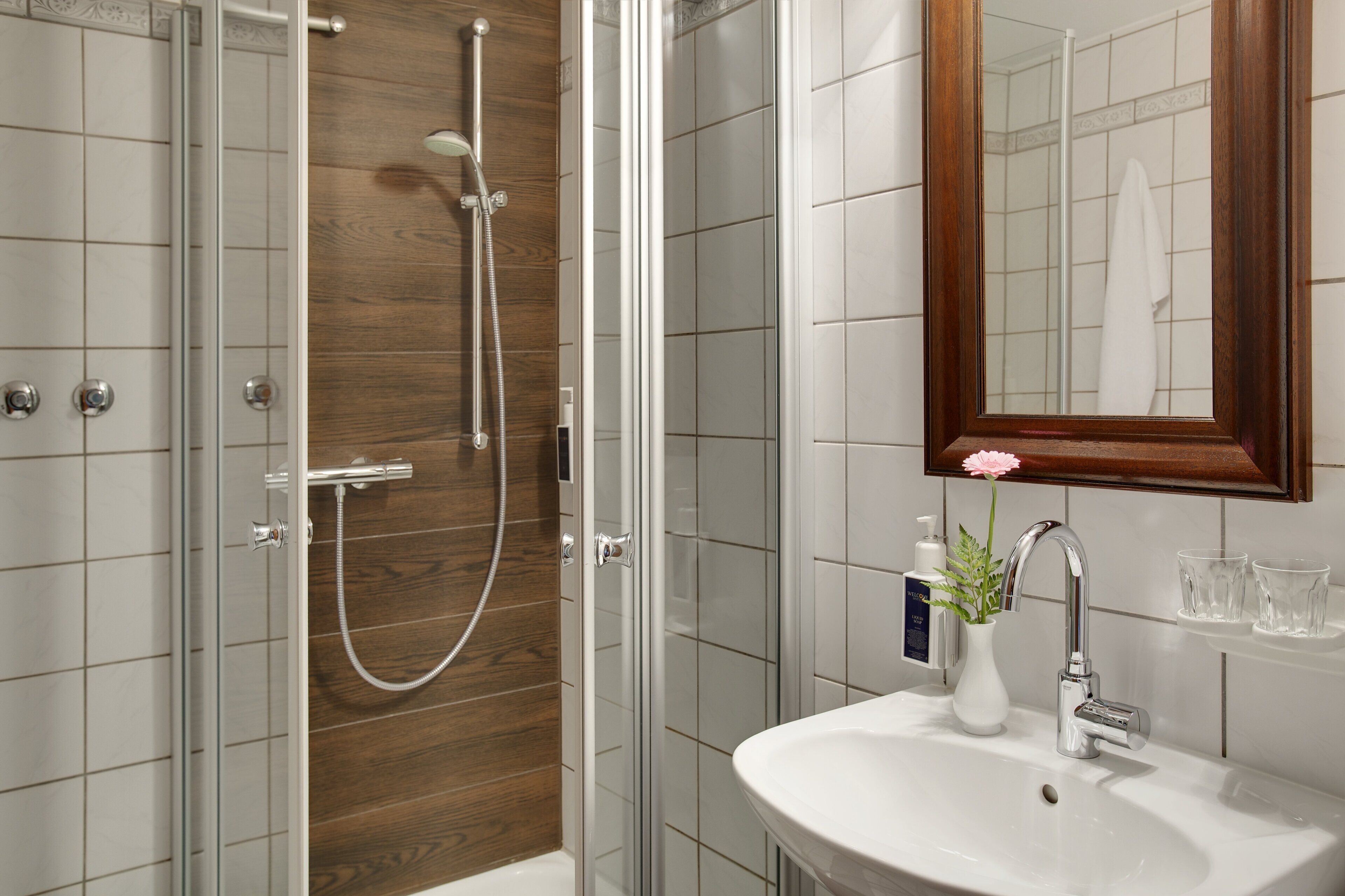 separate bathtub and shower, free toiletries, hair dryer, towels