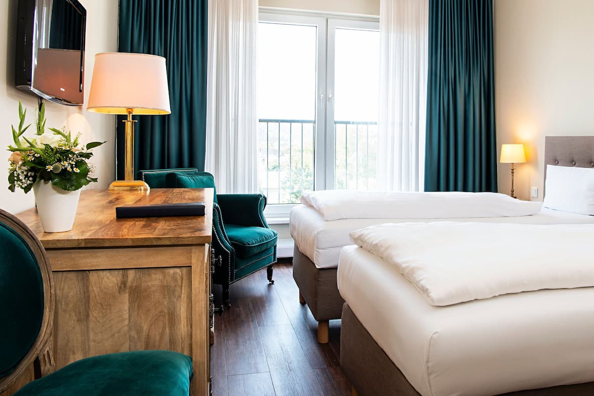 superior twin room | hypo-allergenic bedding, in-room safe, individually decorated, desk