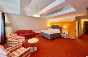 Premium bedding, down duvets, minibar, in-room safe
