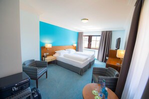 Ropa de cama de alta calidad y minibar 