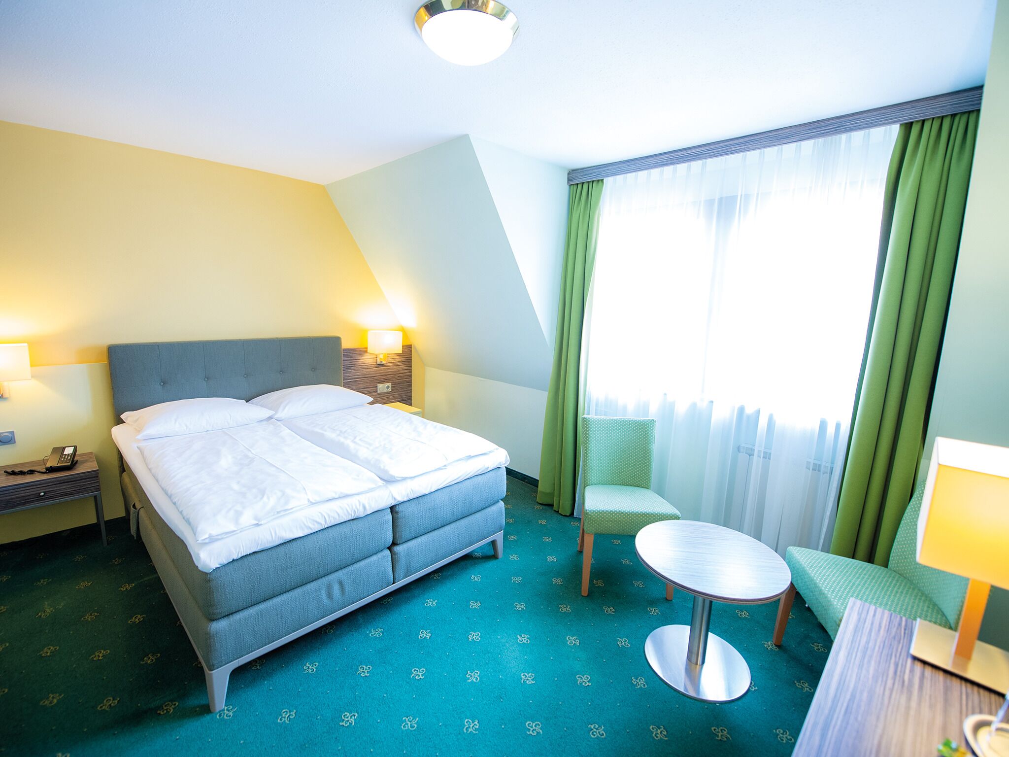 premium bedding, down duvets, minibar, in-room safe