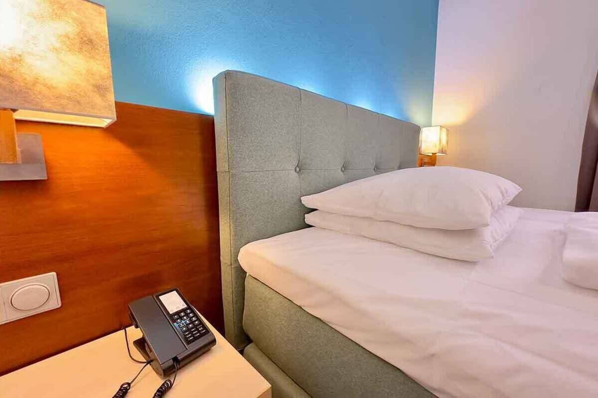 premium bedding, down duvets, minibar, in-room safe