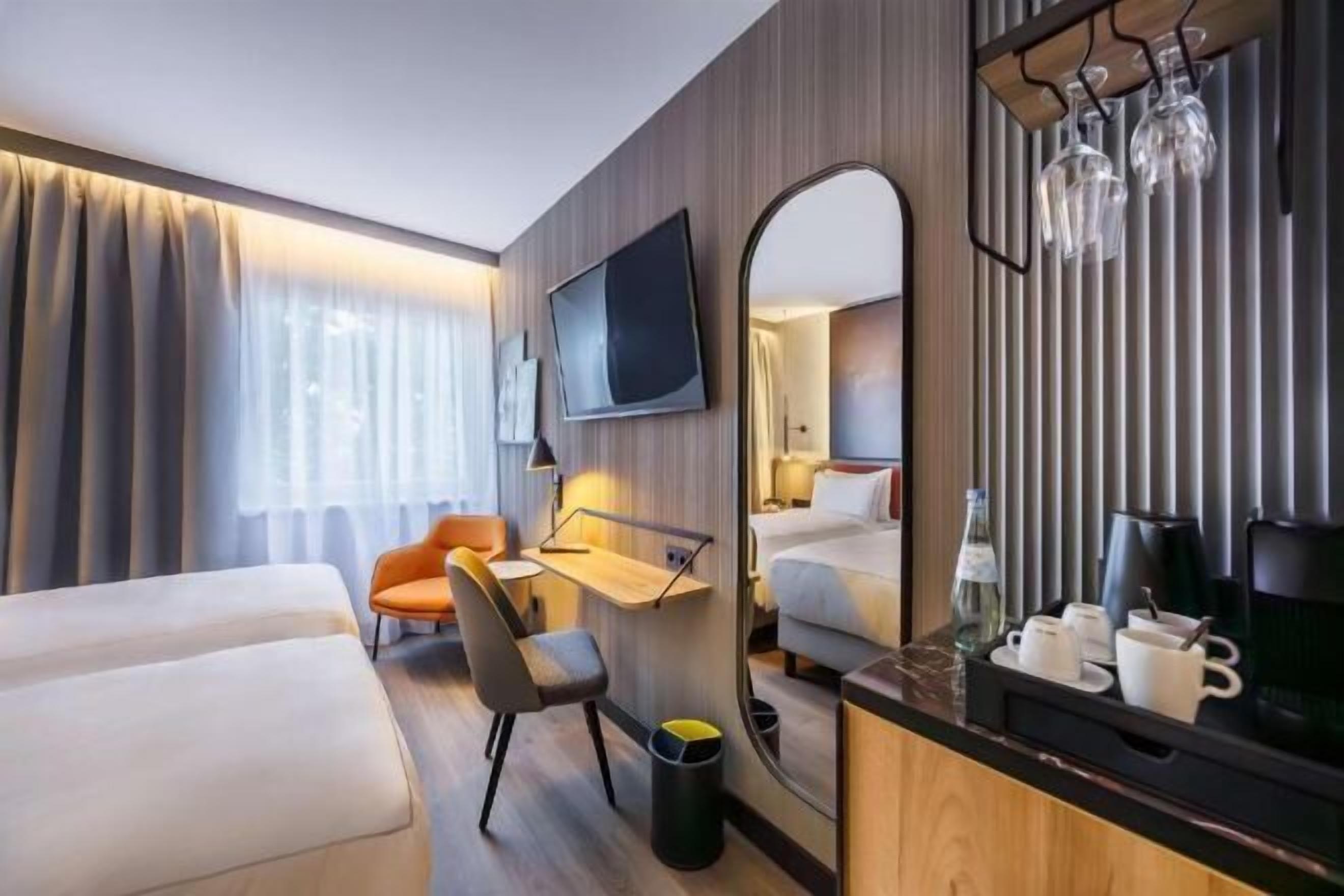 Hypo-allergenic bedding, desk, blackout drapes, soundproofing