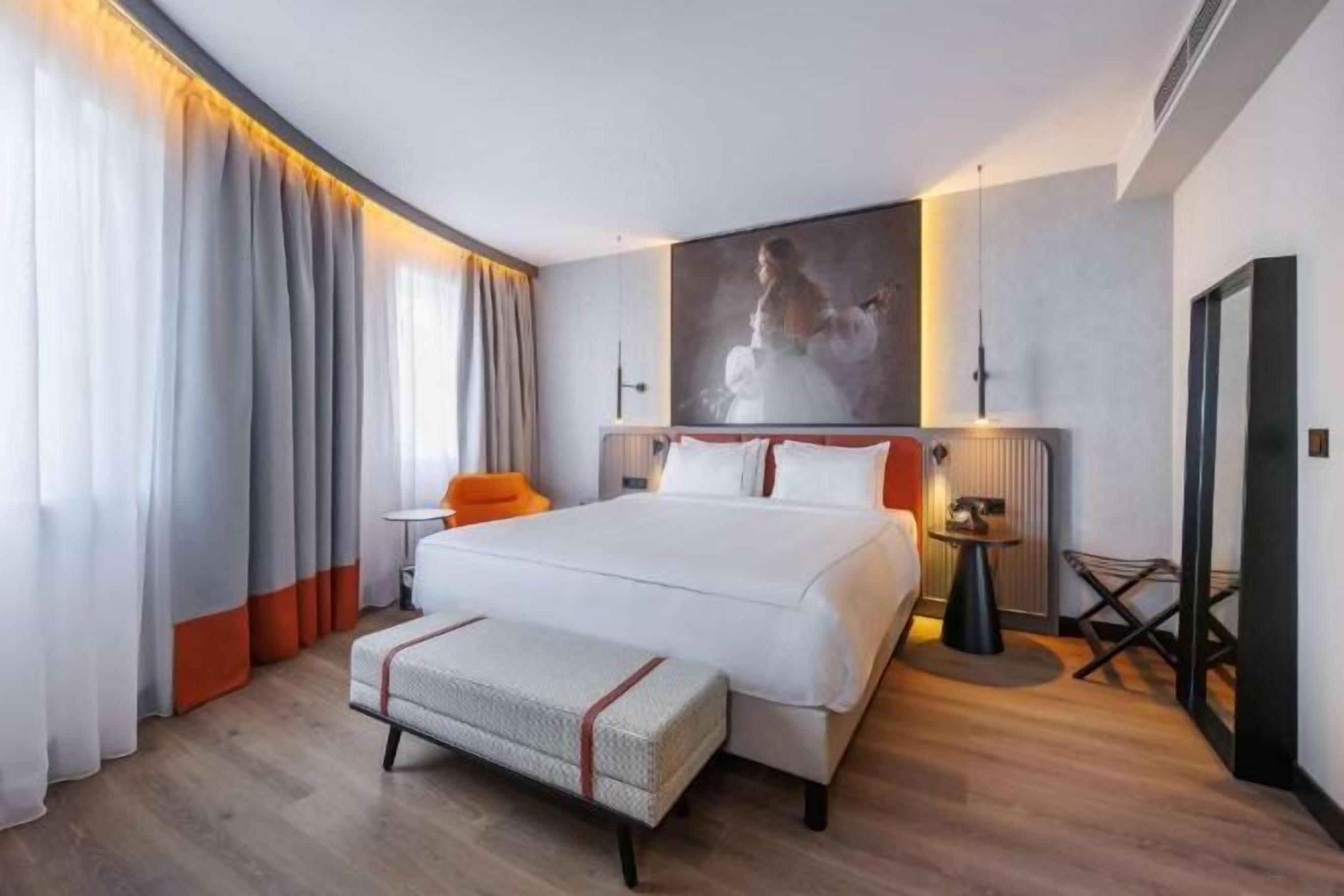 Hypo-allergenic bedding, desk, blackout drapes, soundproofing