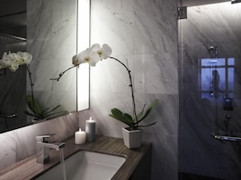 Eco-friendly toiletries, hair dryer, bathrobes, slippers