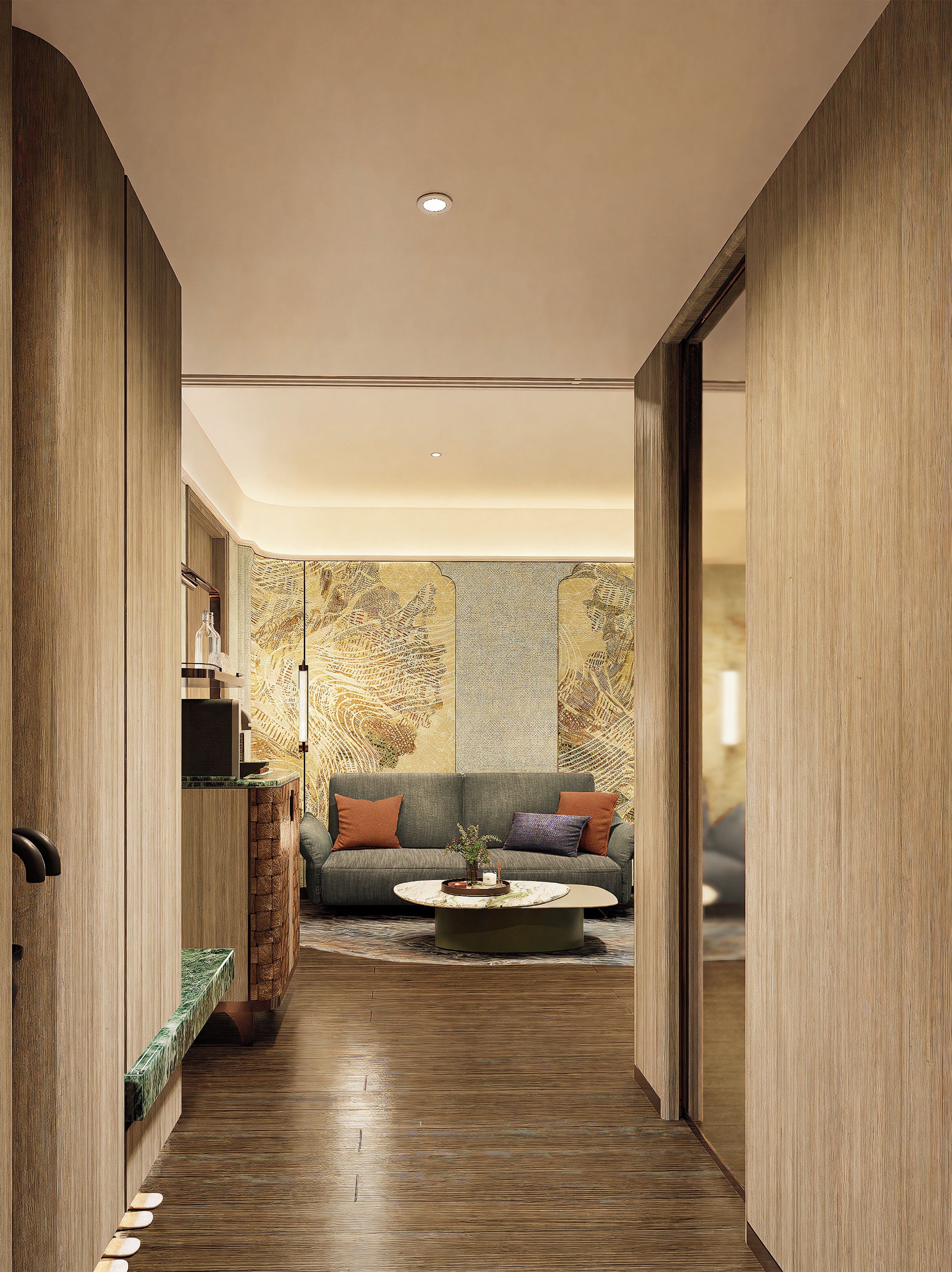 Un interior moderno con suelo de madera, un sofá con cojines y una mesa de centro.
