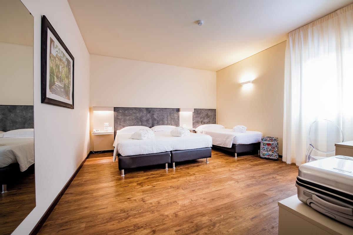 Chambre Triple Supérieure, plusieurs lits