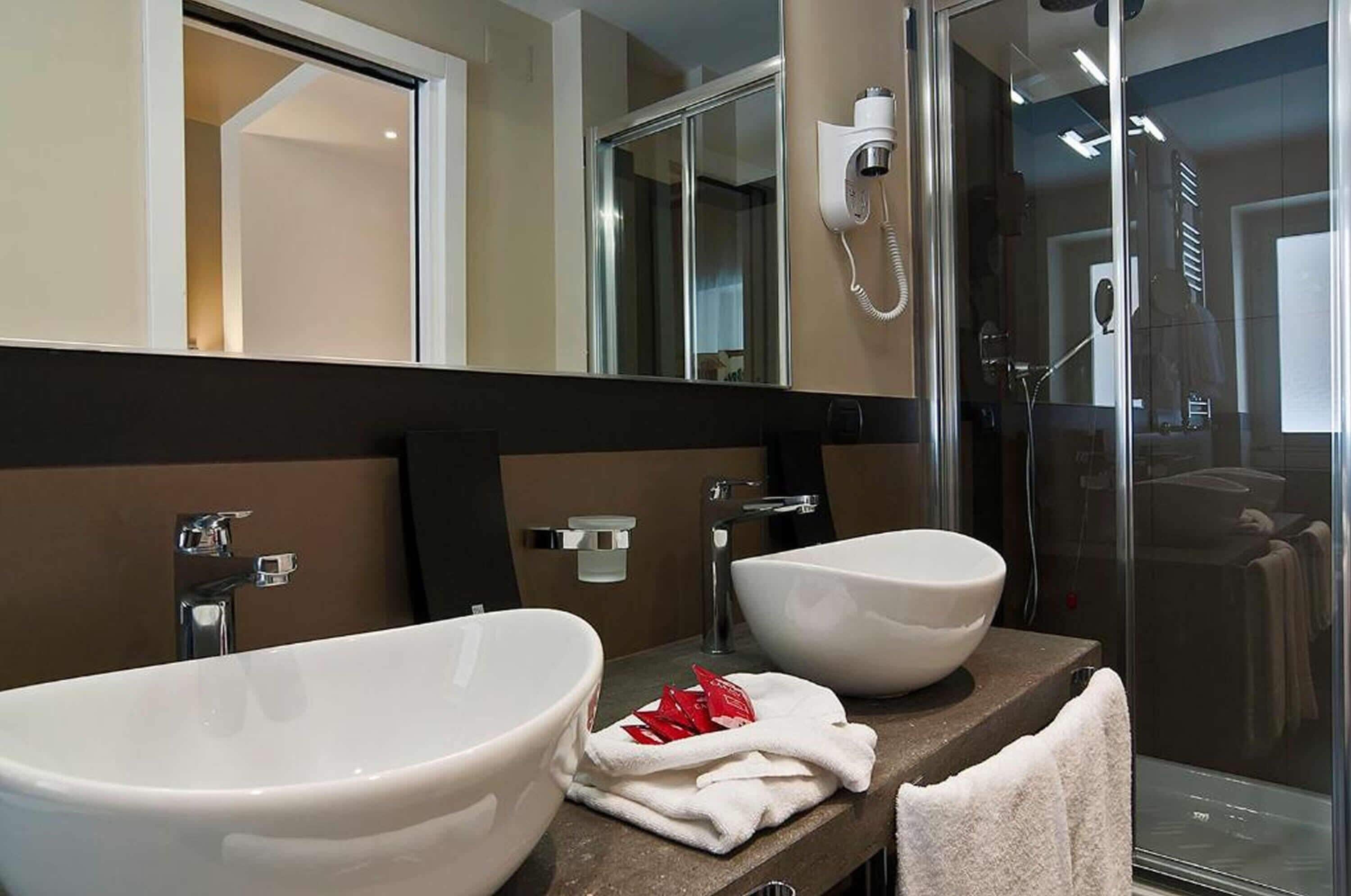 triple room | bathroom | deep-soaking bathtub, rainfall showerhead, free toiletries, hair dryer