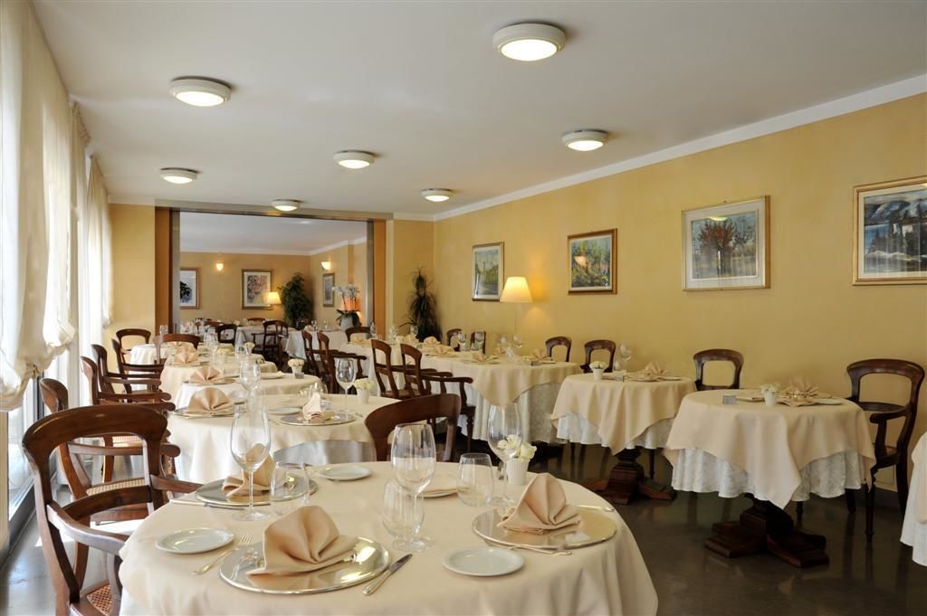 breakfast, lunch, dinner served; italian cuisine, garden views