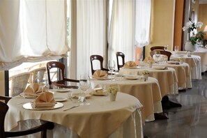 Breakfast, lunch, dinner served; Italian cuisine, garden views 