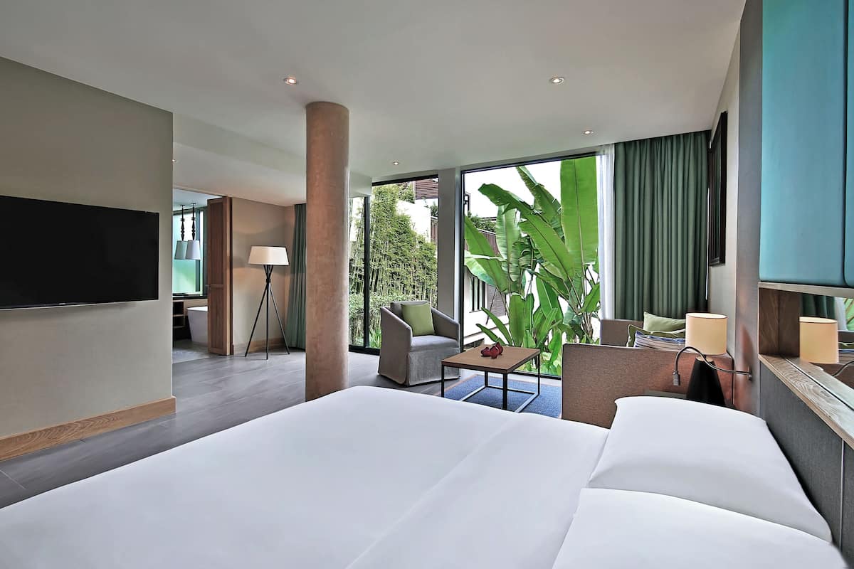 Premium Suite, 2 Bedrooms | Minibar, in-room safe, desk, laptop workspace