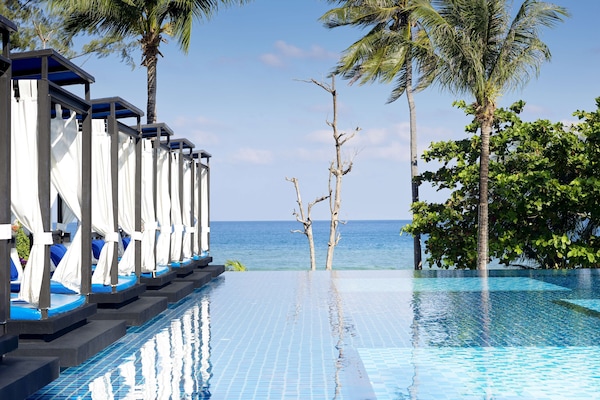 Outdoor pool, free cabanas, pool umbrellas