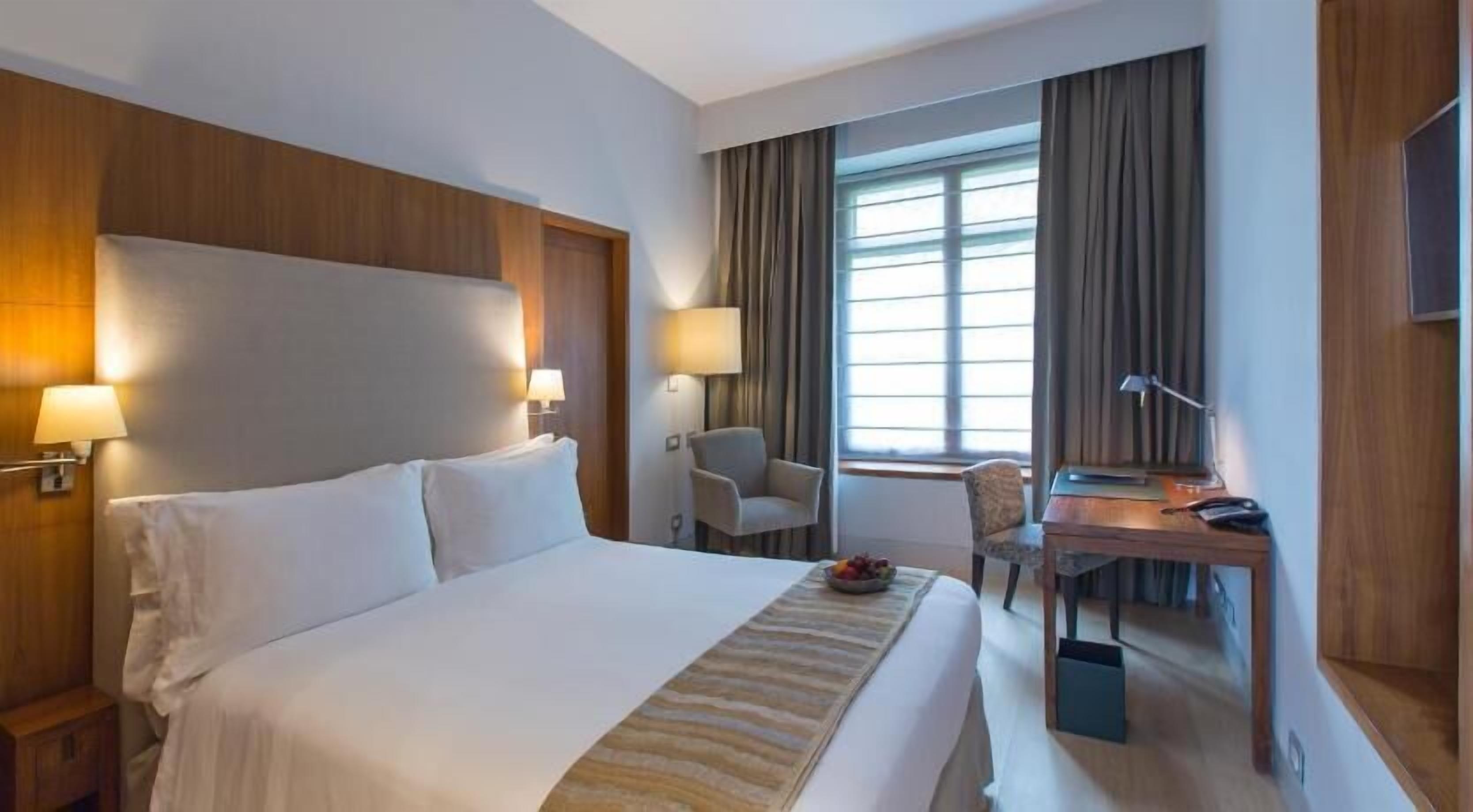 Premium bedding, down comforters, memory foam beds, minibar