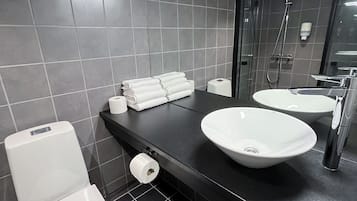 Shower, hair dryer, towels, soap