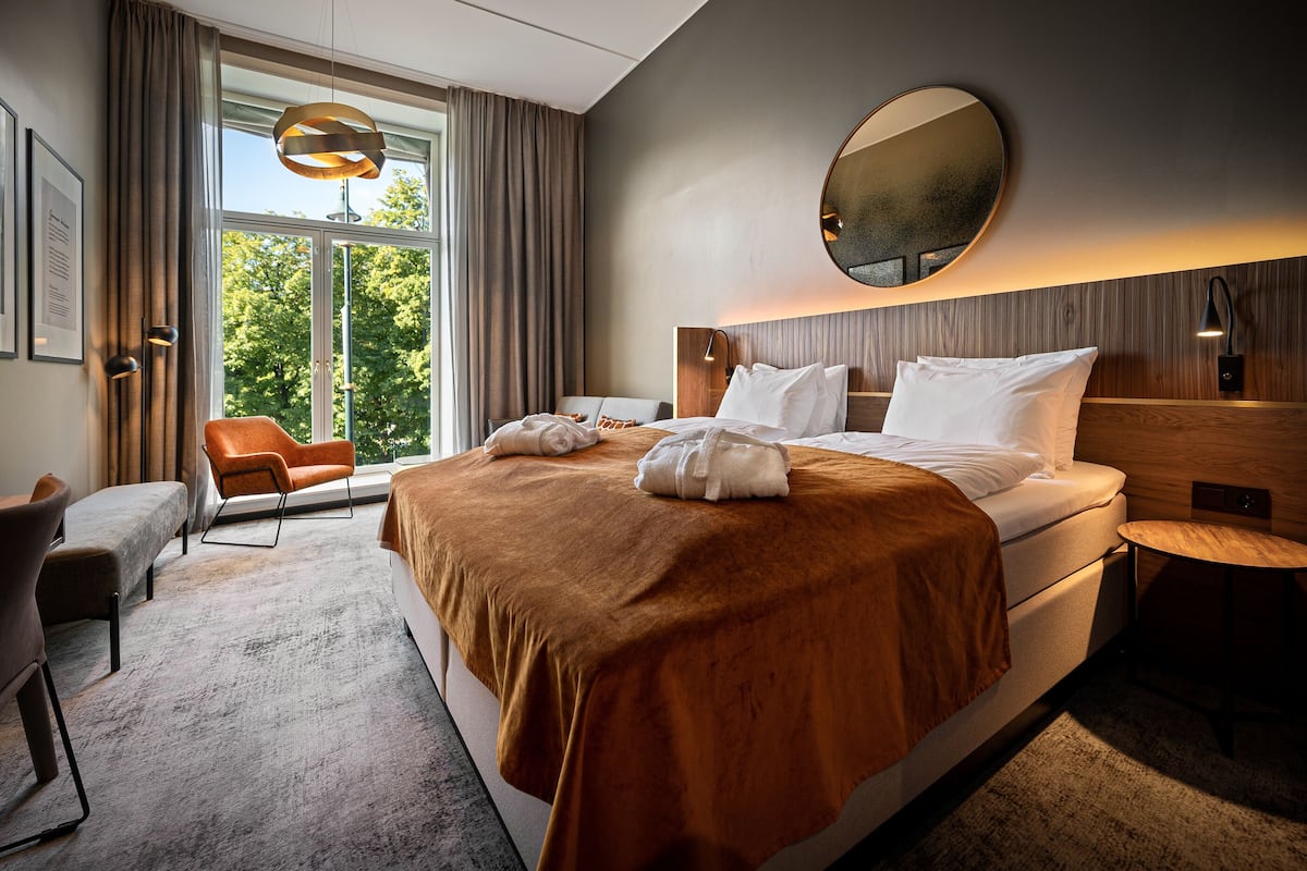 Premium Quadruple Room | Pillowtop beds, in-room safe, desk, blackout drapes