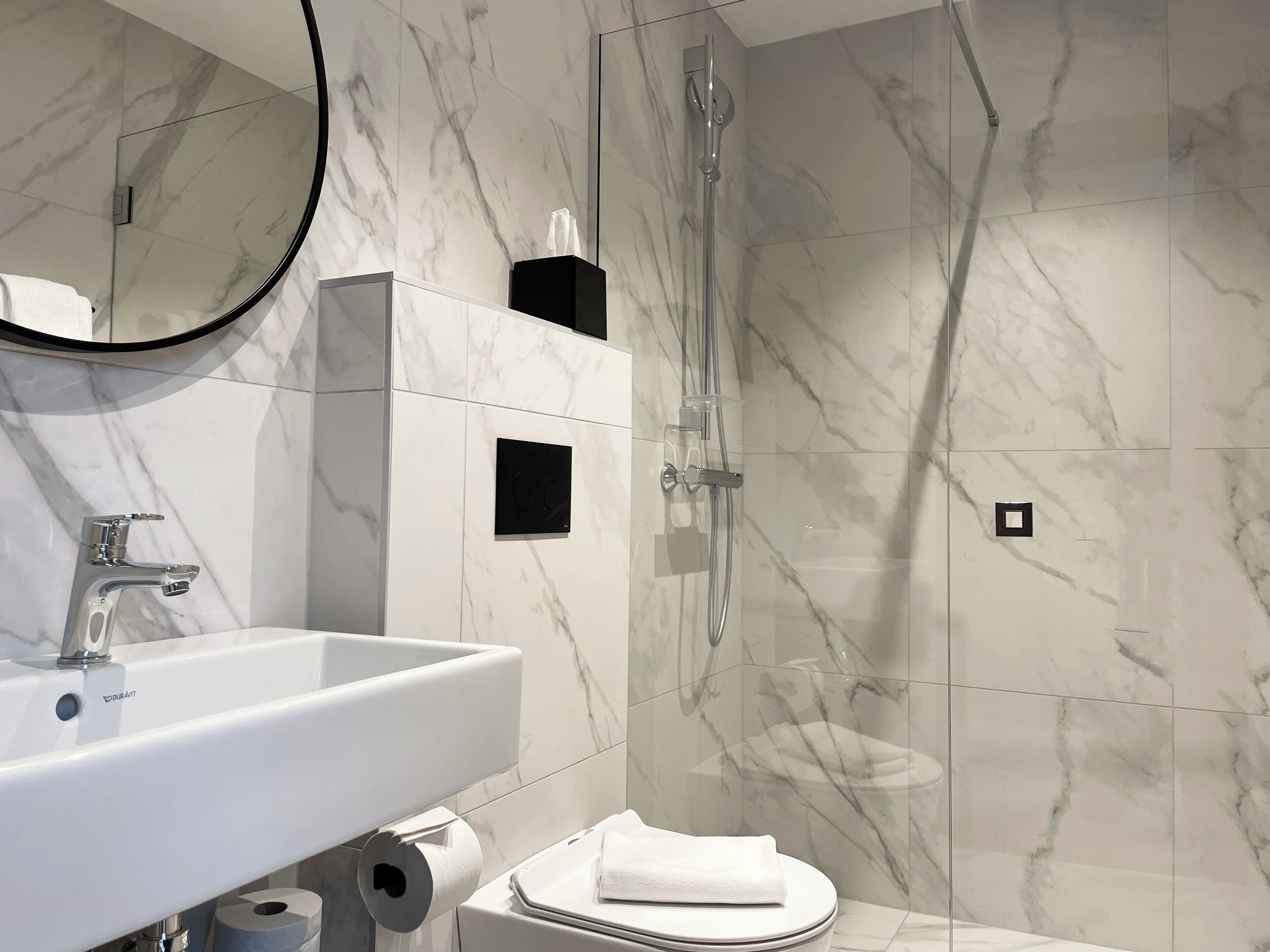 standard double loft | bathroom | hair dryer, towels, soap, shampoo