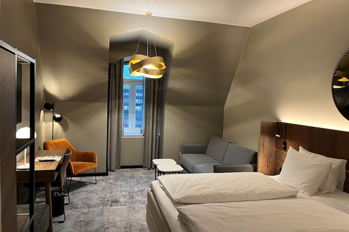 Family Room | Pillowtop beds, in-room safe, desk, blackout drapes