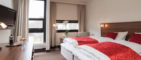 Pillow-top beds, desk, blackout curtains, iron/ironing board