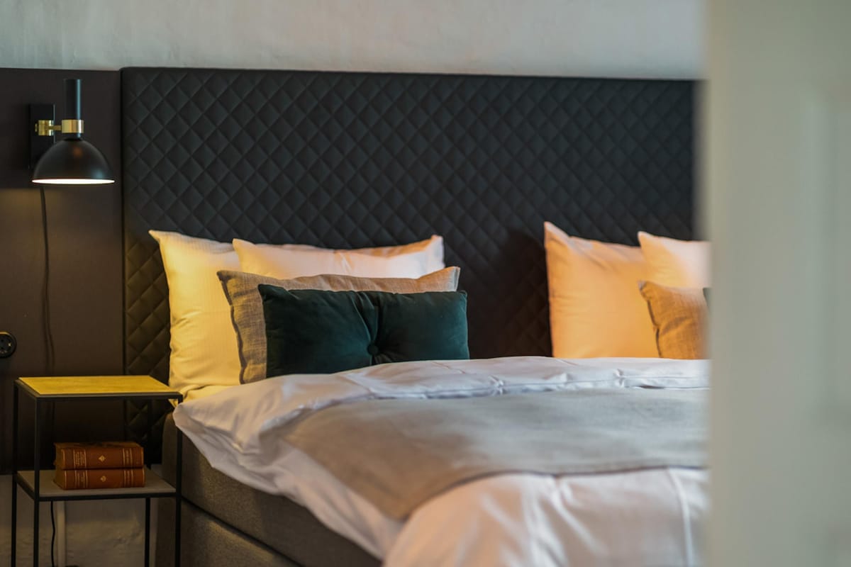 Suite, varias camas, para no fumadores, Terraza | Ropa de cama de alta calidad, minibar, escritorio y cortinas blackout