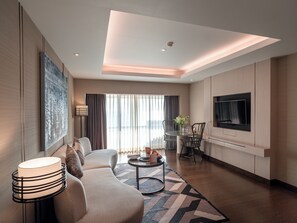 Deluxe Suite, 1 King Bed, Sea View | Living area | 43-inch LCD TV with cable channels, TV - Pullman Phuket Karon Beach Resort (Karon)