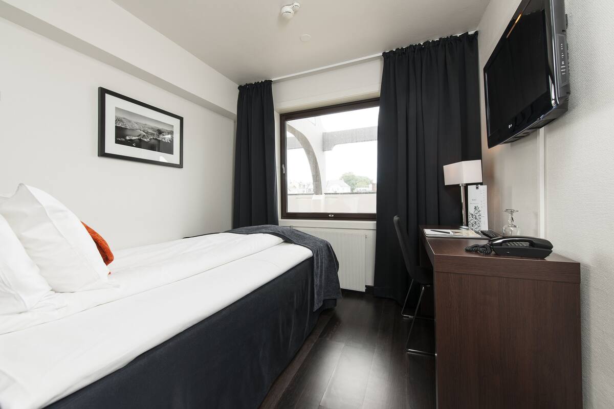Desk, laptop workspace, iron/ironing board, cribs (surcharge)