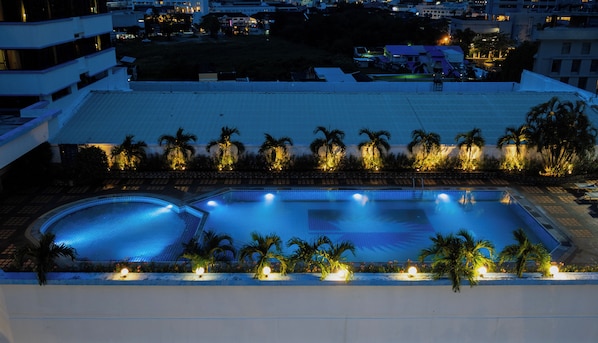 Outdoor pool, open 7:00 AM to 10:00 PM, pool umbrellas, pool loungers