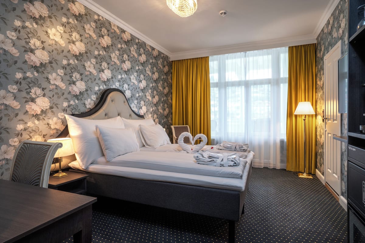 Deluxe Room, Non Smoking (Historical Building, No Elevator) | Minibar, desk, laptop workspace, blackout drapes