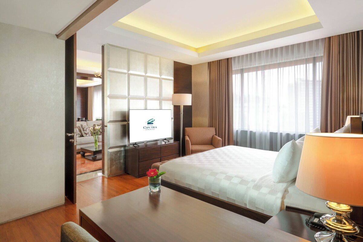 Suite presidencial | Ropa de cama de alta calidad y minibar 