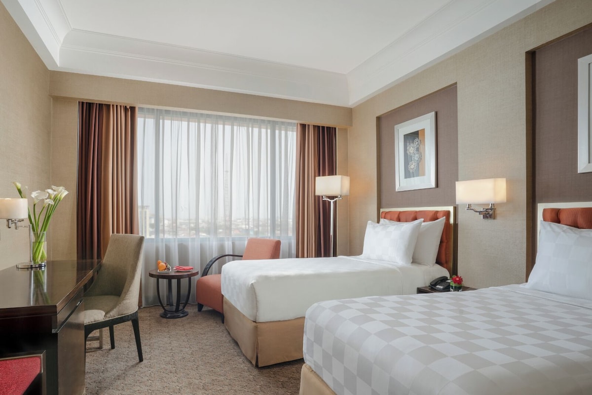 Ropa de cama de alta calidad y minibar 