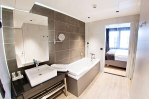 Junior Suite, 1 King Bed (extra bed possibility) | Bathroom | Free toiletries, hair dryer, towels, soap