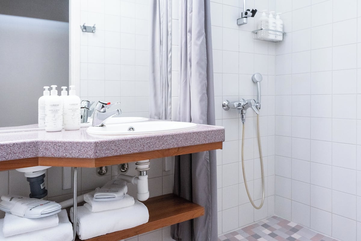 superior room, 1 queen bed | bathroom | hair dryer, bidet, towels