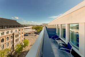 A modern building with large windows and a covered walkway. - Klaus K Hotel (Helsinki)